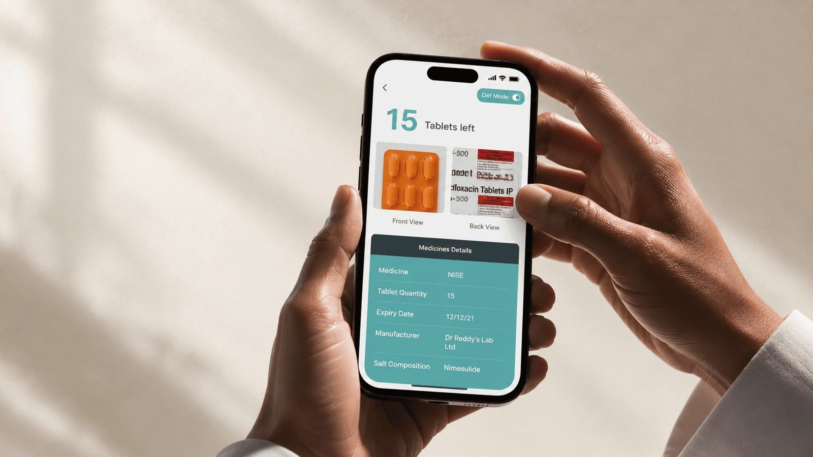 Hand holding a phone showing the MedEasy medicine tracker